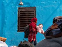 Profuga sudanese con il figlio in braccio - Foto Wfp/Sir