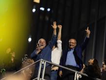 epa13332182 Brazilian President Luiz Inacio Lula da Silva (C) speaks alongside Vice President Geraldo Alckmin in front of supporters celebrating his victory in Sao Paulo, Brazil, 25 October 2026. EPA/ISAAC FONTANA