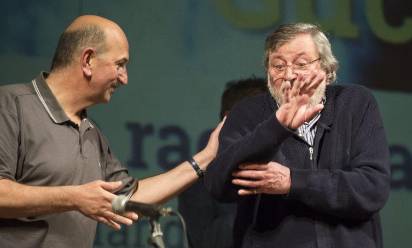 Don Brunetto Salvarani con Francesco Guccini